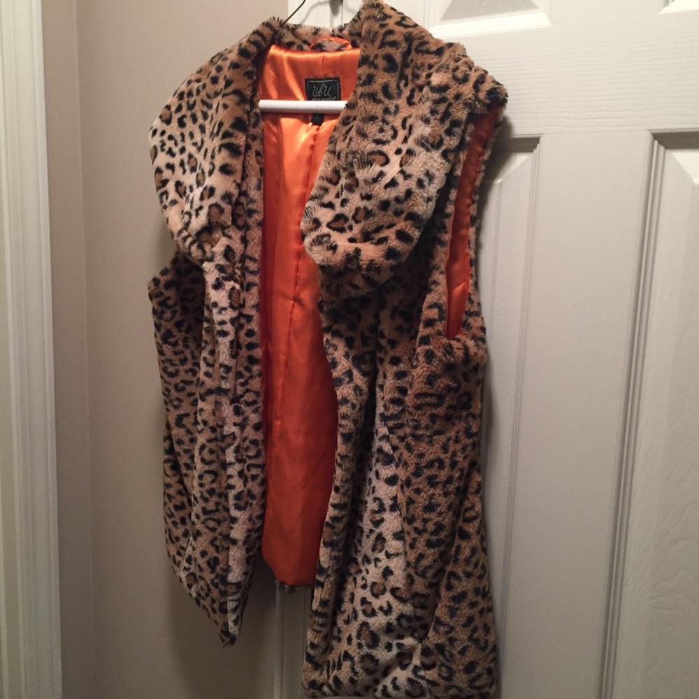 Plush cheetah pattern vest.
